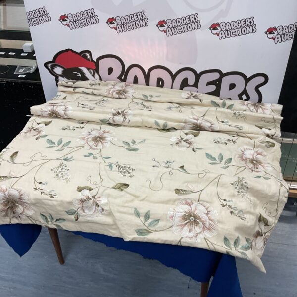 Floral roman blind with colourful pattern, requires cord.