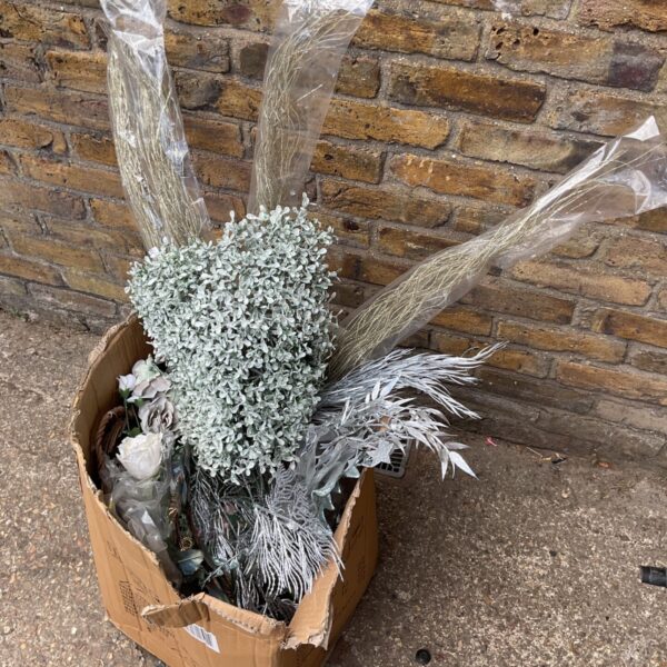 Job lot of florist bouquet accessories with green foliage.