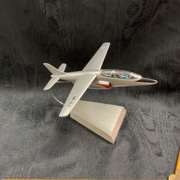 Vintage FMA IA-63 Pampa model on metal stand.