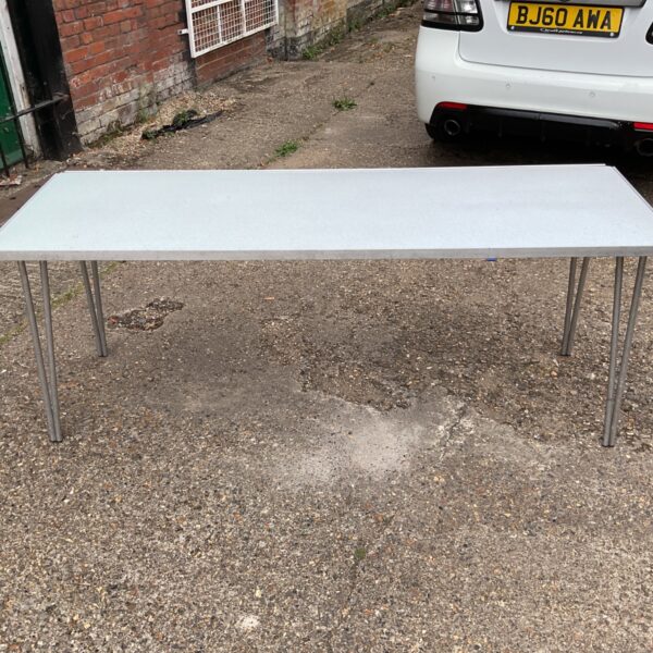 Grey foldaway table, ideal for portable use and events.