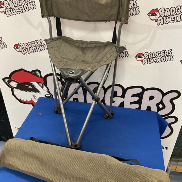 Two folding camp stools, ideal for outdoor use and portable seating.