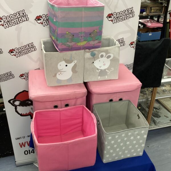 Colourful folding storage boxes stacked for organisation.