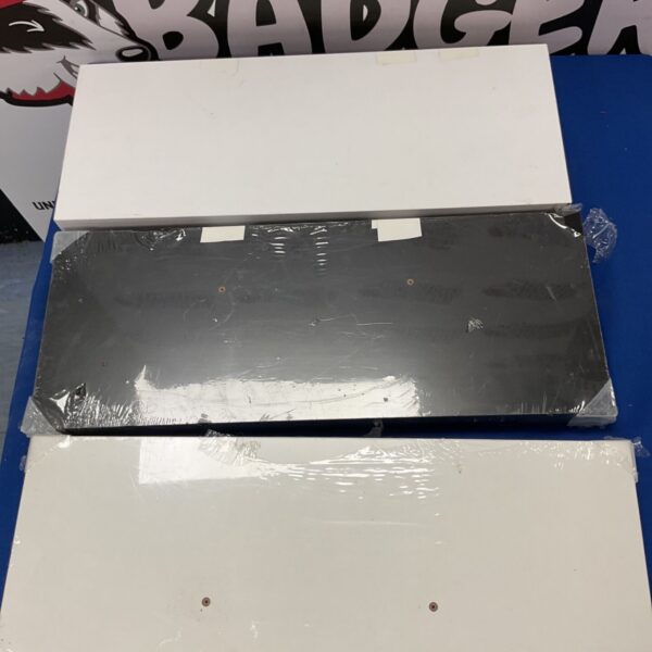 Stack of two Form Cusko floating shelves, ready for wall mounting.