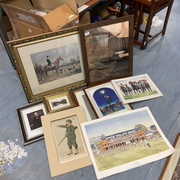 Collection of vintage framed prints including Winston Churchill portrait.