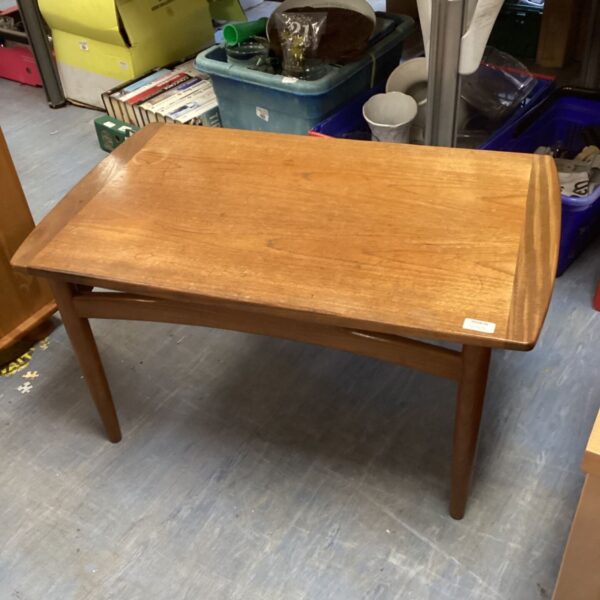 Mid-century G Plan teak coffee table with rounded edges.