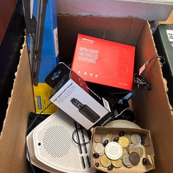Garmin high-speed multi charger with coins and radio.