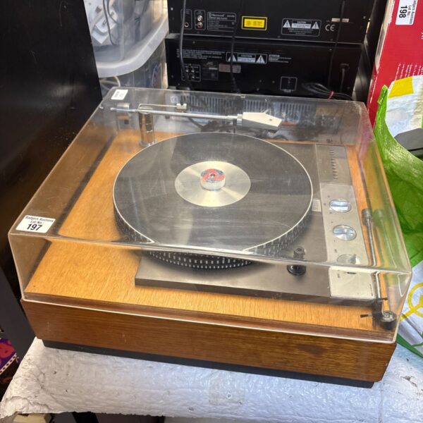 Vintage Garrard 401 turntable with wooden plinth, classic audio equipment.
