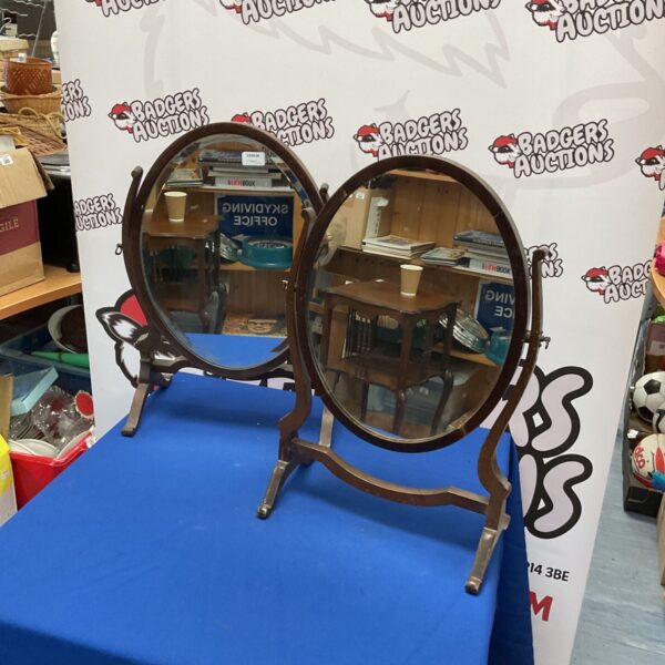Antique Georgian mahogany dressing table mirror with elegant frame.