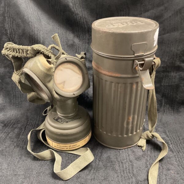 WW2 German gas mask and tin, dated December 1940.