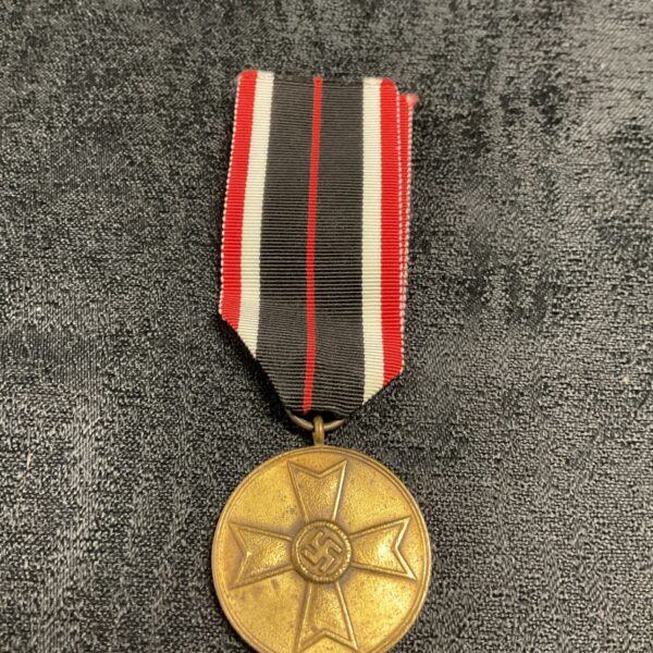 Front view of a German War Merit Medal with swastika.
