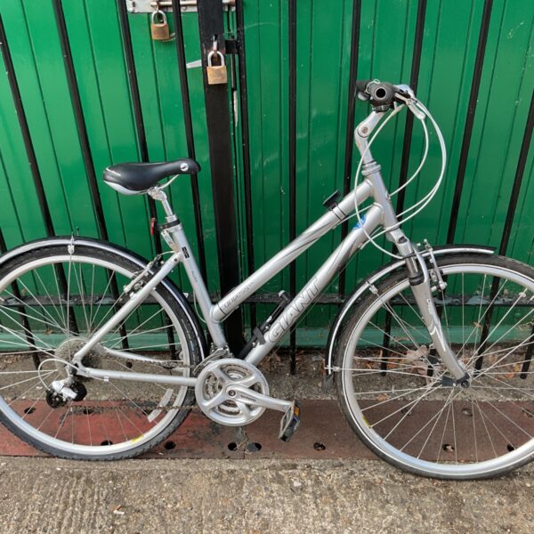 Silver Giant Cypress DX women's hybrid bike with gears.