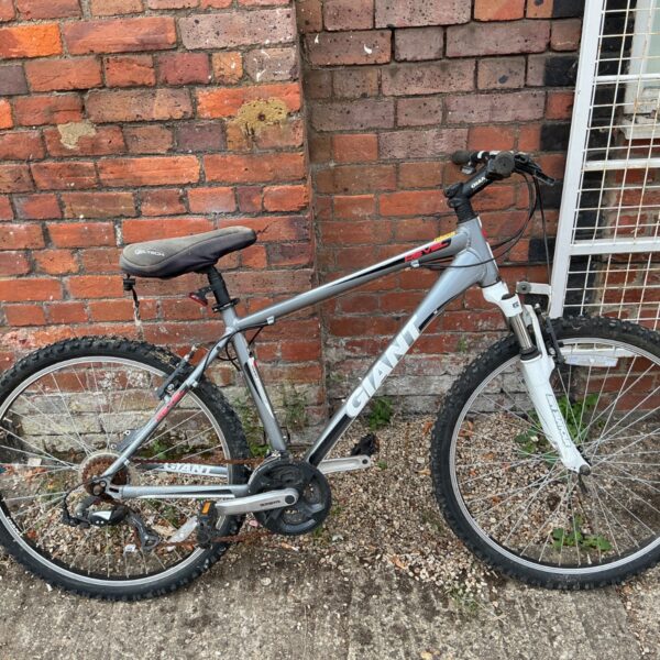Silver Giant Revel mountain bike with 26 inch wheels and front suspension.