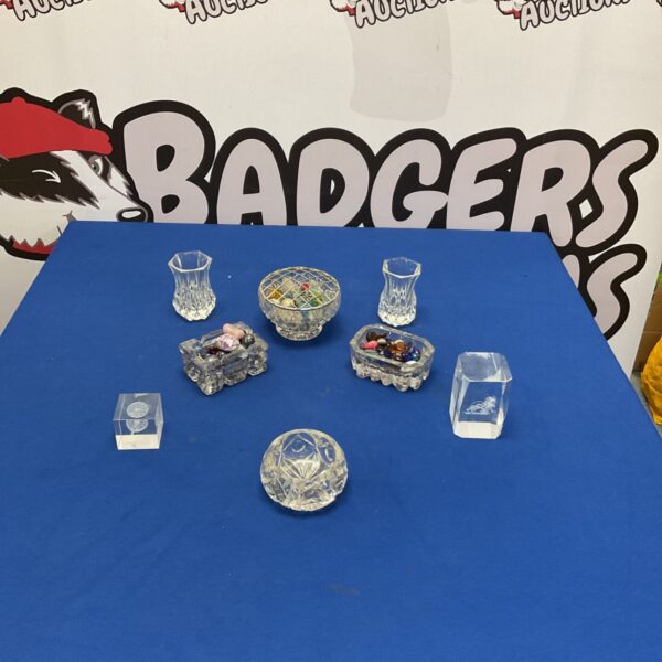 Vintage glass ornaments and beads collection on display.