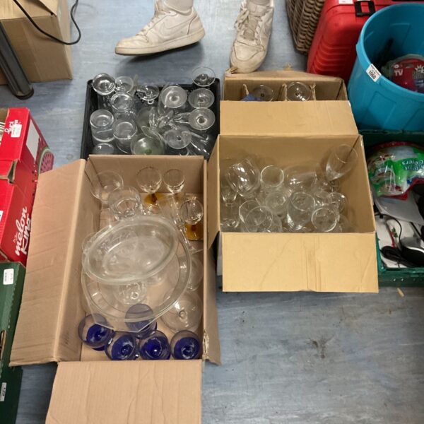 Job lot of assorted glassware including wine glasses and drinking glasses.