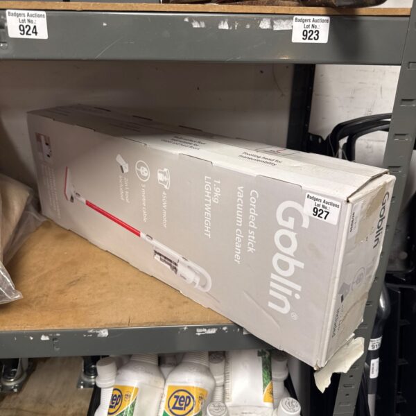 Front view of Goblin corded stick vacuum cleaner packaging.