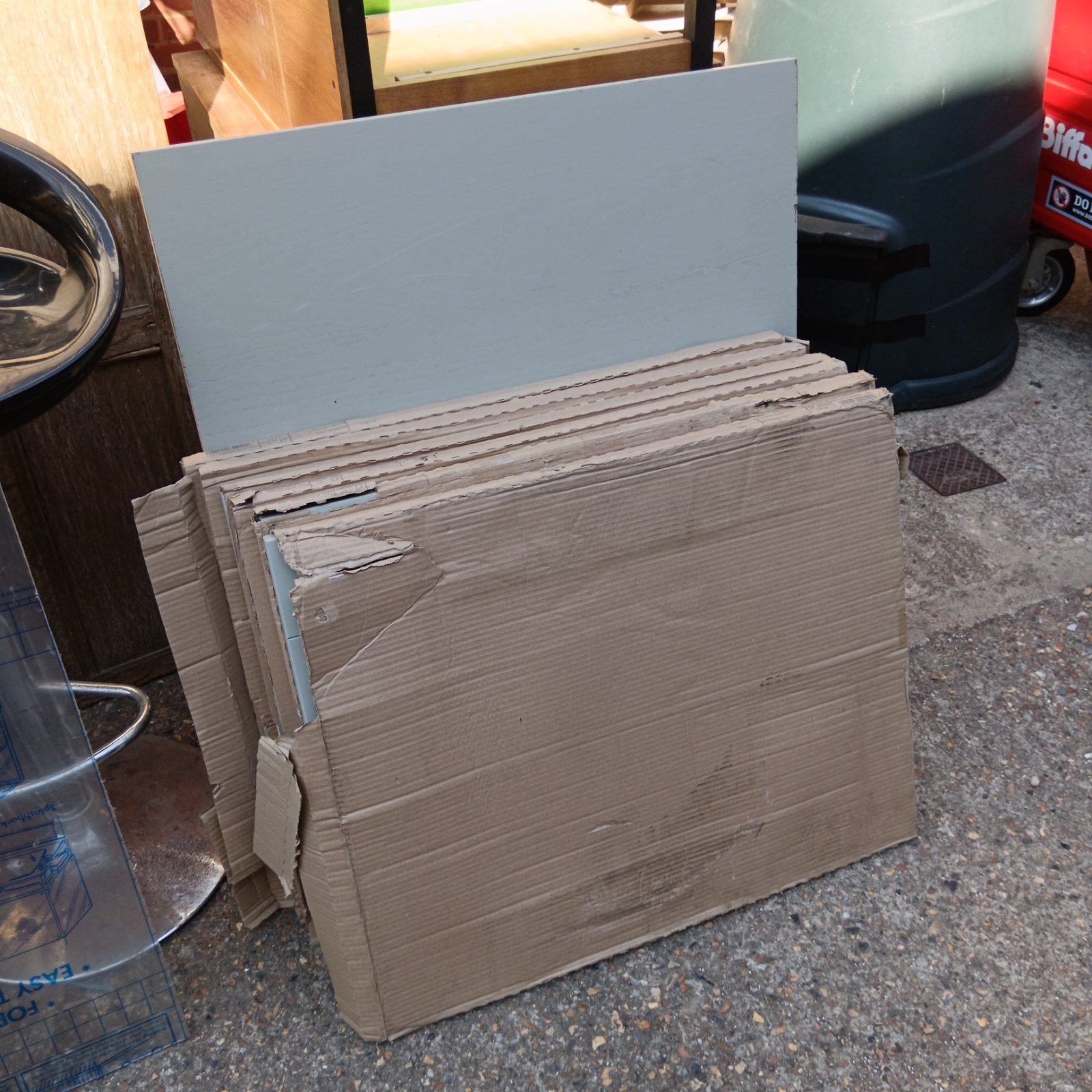 Lot of six grey cupboard doors for kitchen renovation.