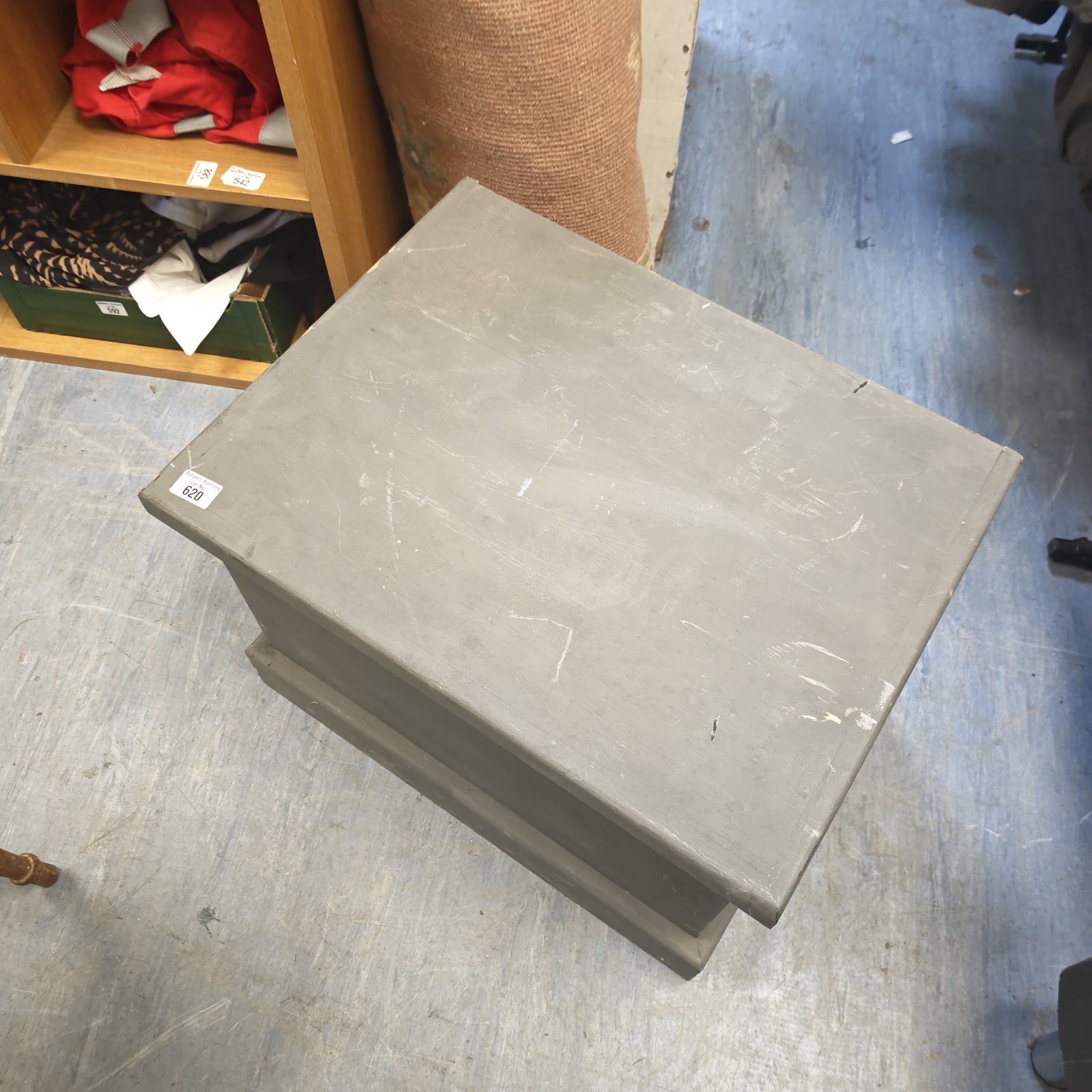 Grey painted wooden storage chest with vintage wear.