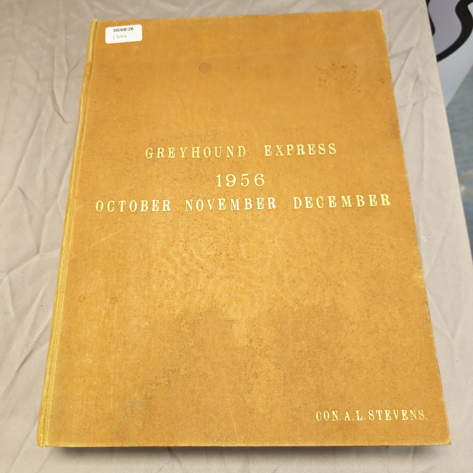 Vintage Greyhound Express 1956 magazine cover, detailed racing information.