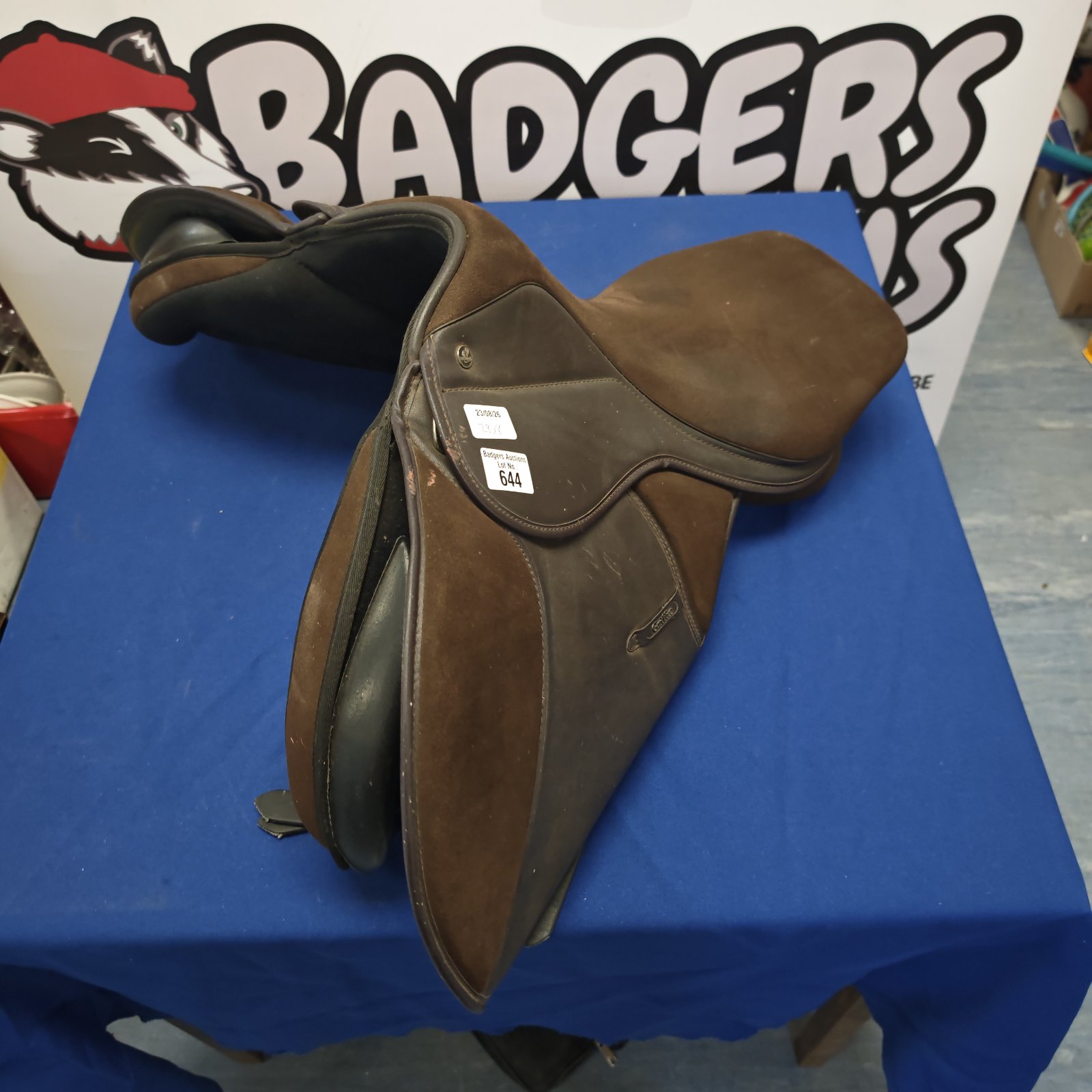 Brown leather Griffin horse riding saddle with suede seat.