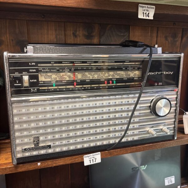 Vintage Grundig Yacht-Boy 210 transistor radio, showing dial and controls.