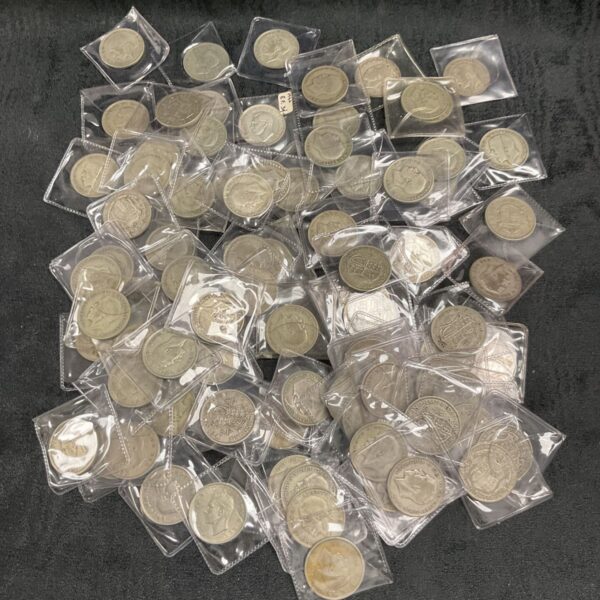 Lot of approximately 90 British Half Crown silver coins for collectors.