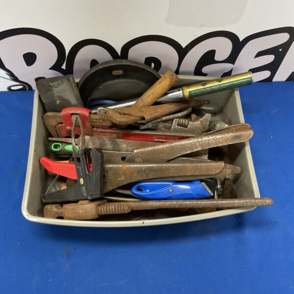 Vintage hand tool collection with wrenches, pliers, and a utility knife.