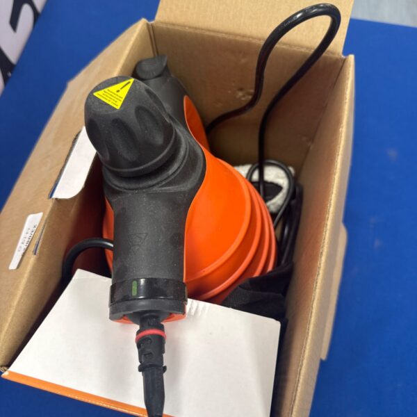 Used handheld steam cleaner machine for home cleaning.