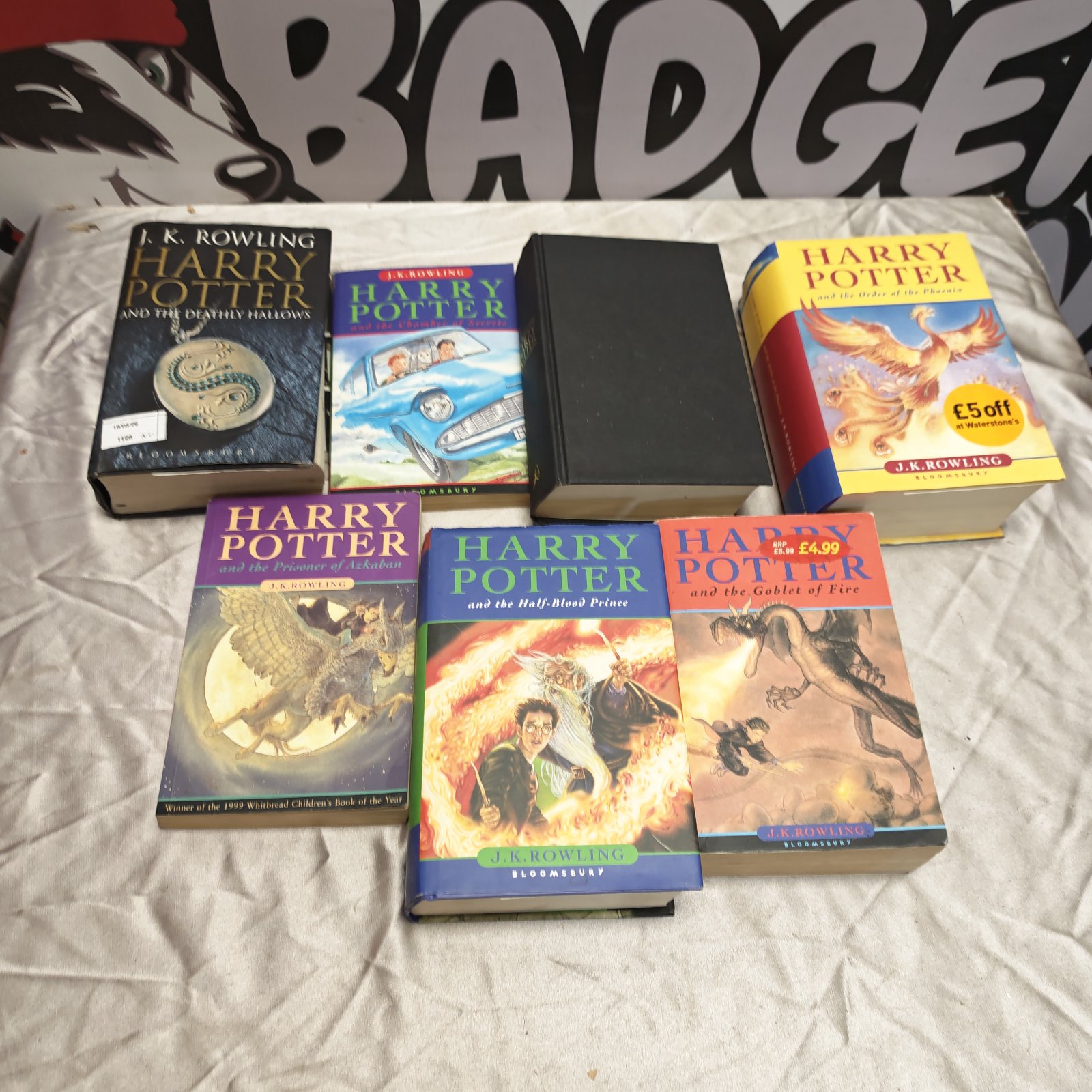 Bundle of used Harry Potter books by J.K. Rowling.