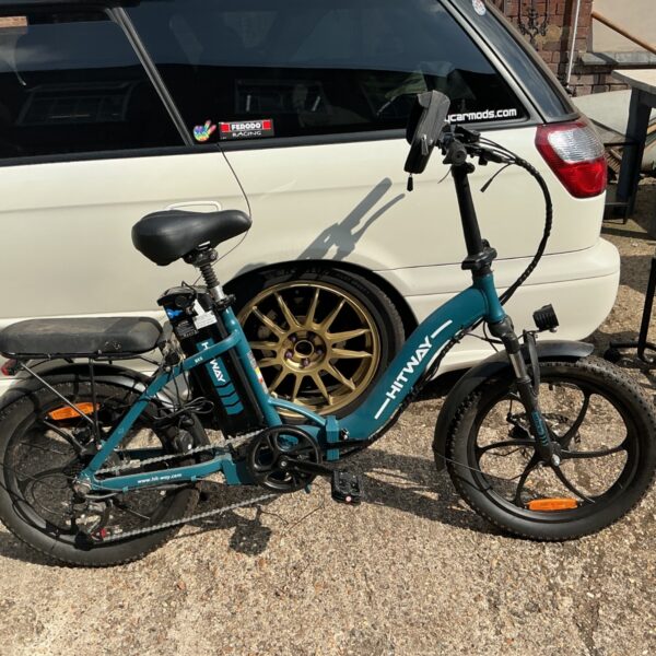 Dark teal Hitway BK6 folding electric bike with fat tires.