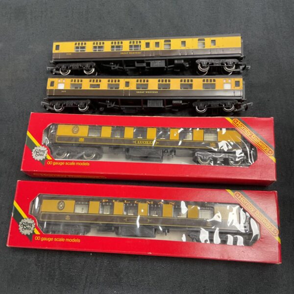 Hornby OO gauge Lucille Pullman car and GWR coaches for model railways.