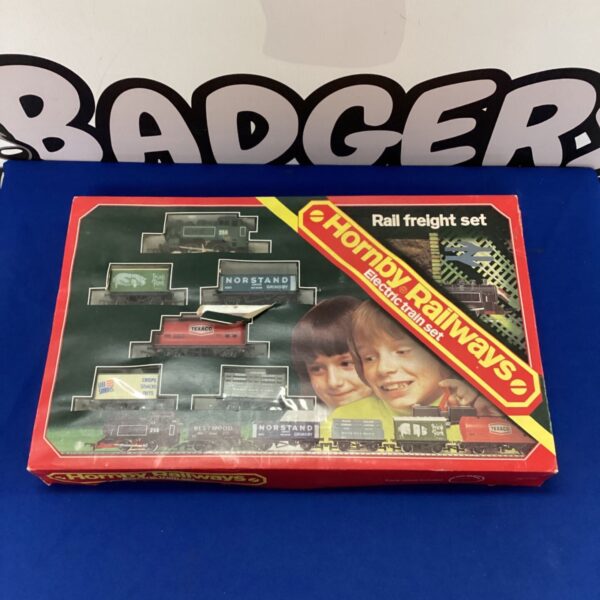 Vintage Hornby Railways O gauge electric train set with freight cars.