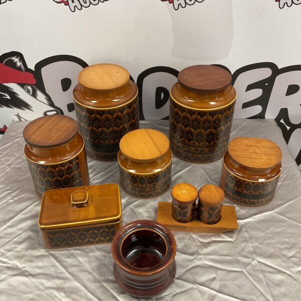Vintage Hornsea pottery jars with wooden lids, a collectable kitchen set.