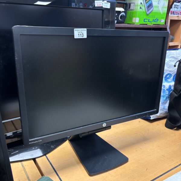 HP 58.4cm LCD monitor for computer use, black casing.