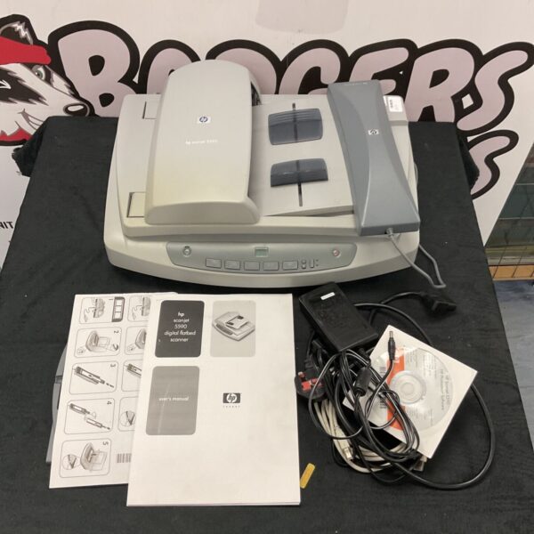 HP Scanjet 5590 flatbed scanner for digitizing documents and photos.