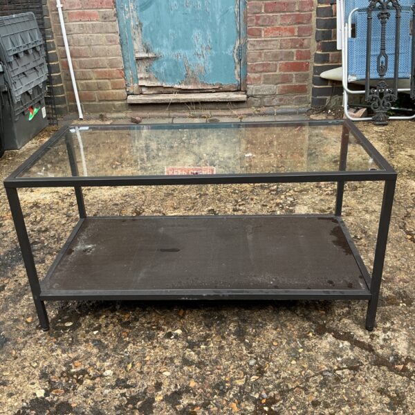 IKEA VITTSJÖ coffee table with glass top and metal frame.