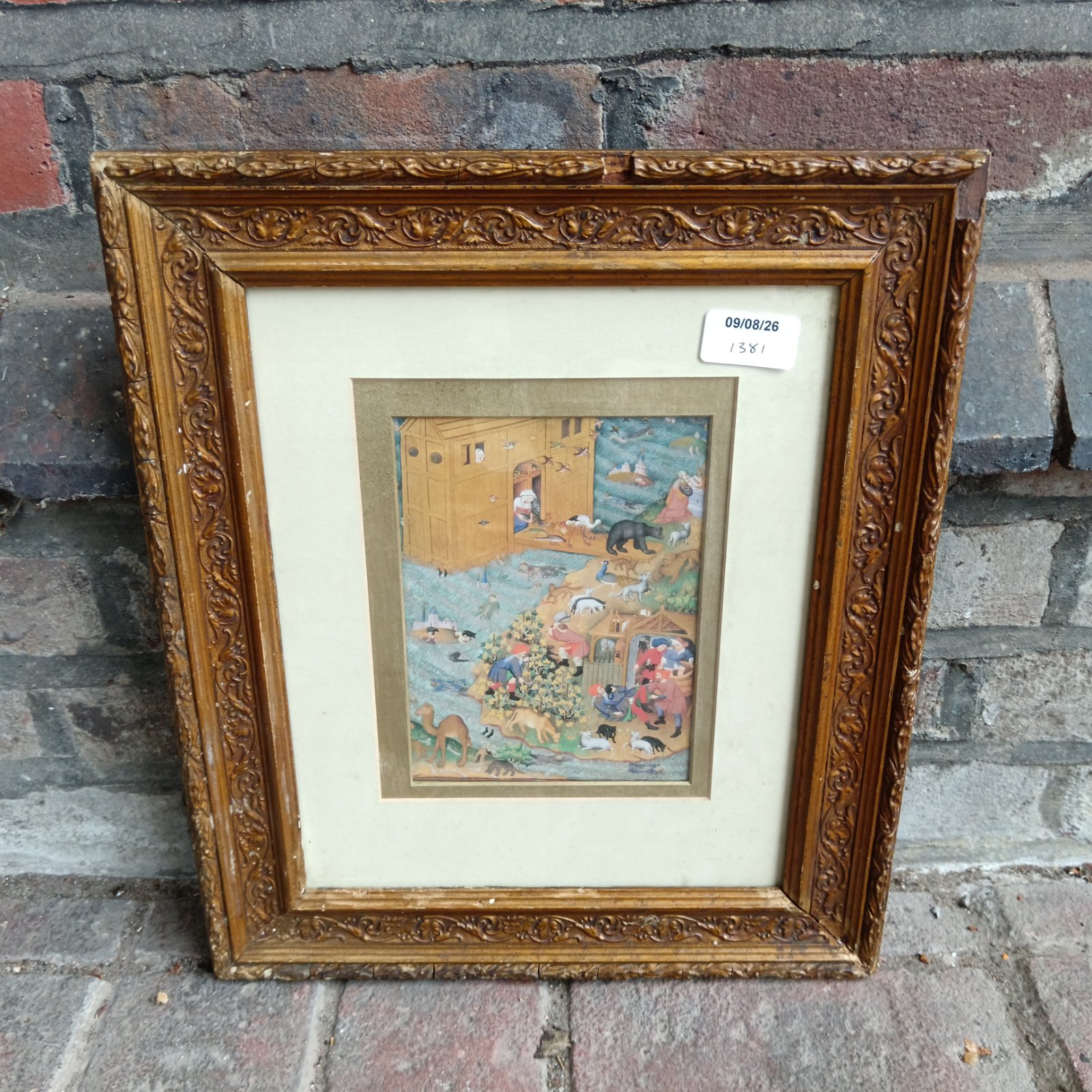 Antique illuminated manuscript picture in a gilt frame.