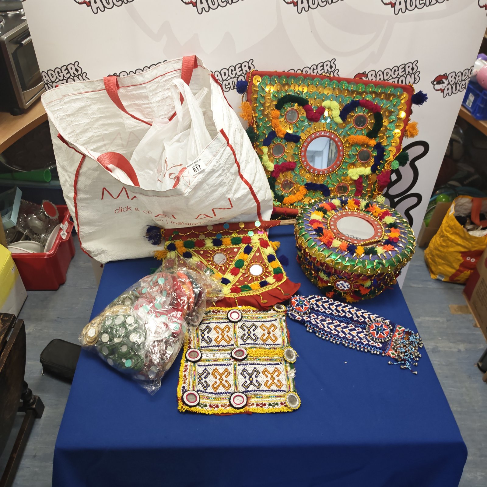 Colourful Indian craftwork lot with decorative box and embroidered items.