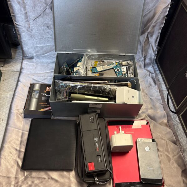Mixed lot of Apple iPhone parts and accessories for repair or collection.