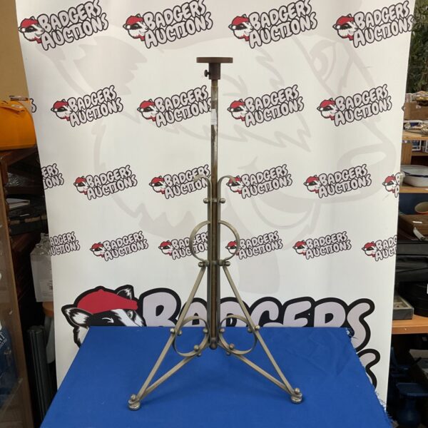Large vintage iron tripod candle stand with rustic patina.