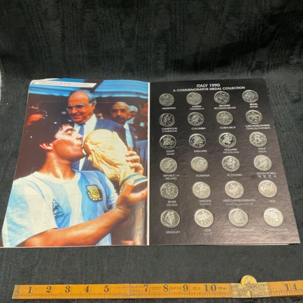 Italy 1990 World Cup medal collection front cover with football players.