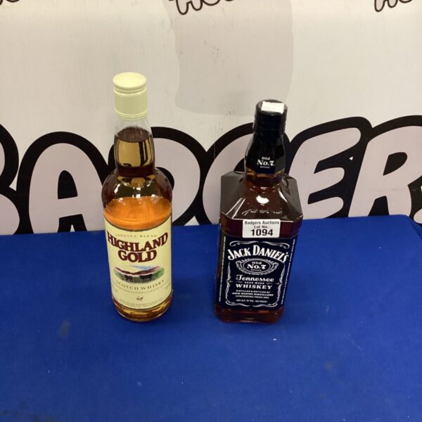 Pair of vintage Jack Daniels and Highland Gold whisky bottles.