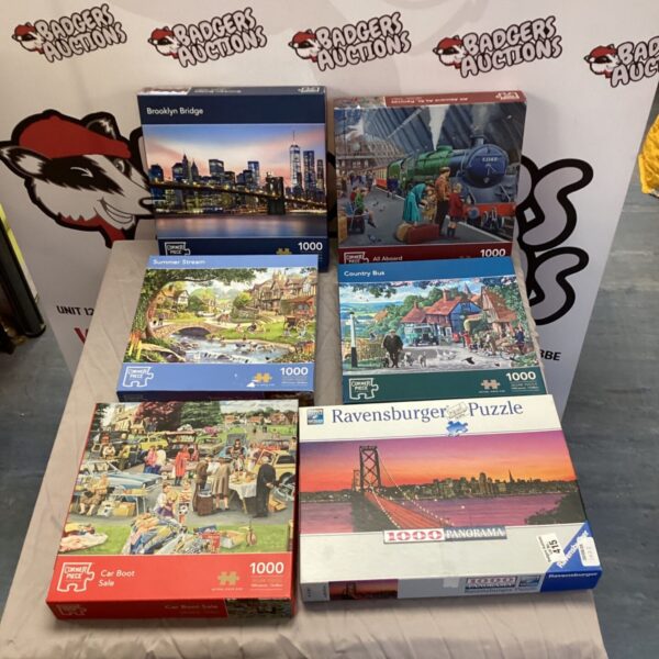 Lot of six jigsaw puzzles including Ravensburger puzzle.