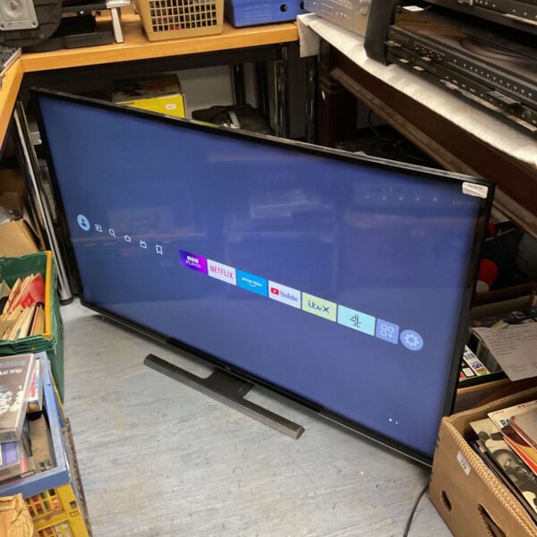 Front view of a JVC 50 inch smart 4K television displaying the home screen.