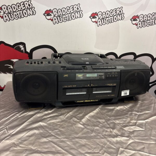 Vintage JVC RC-X510 portable CD player with radio and cassette deck.