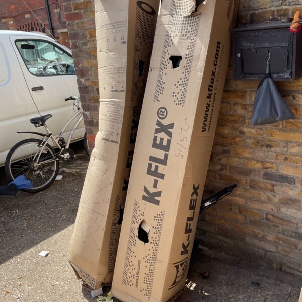 Two boxes of K-Flex pipe insulation for thermal and acoustic lagging.