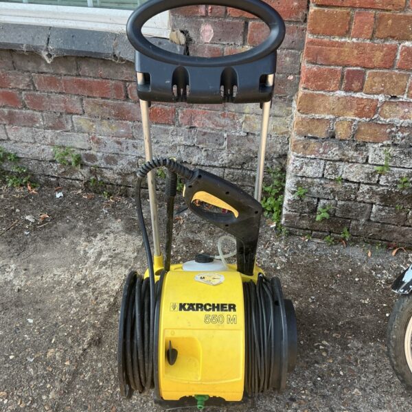 Yellow and black Karcher 550m pressure washer for garden cleaning.