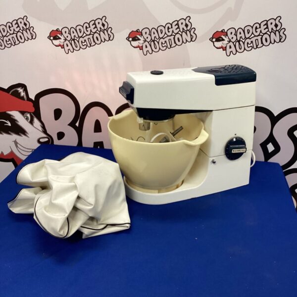 White vintage Kenwood Chef Mixer for baking and food preparation.