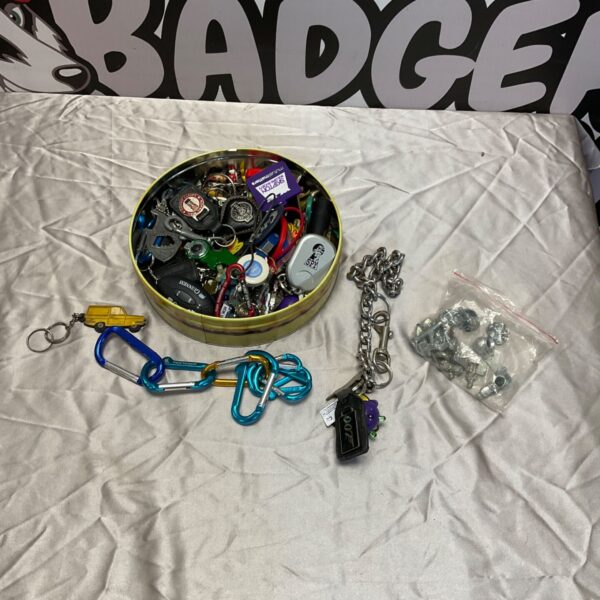 Large lot of vintage key rings and chains for collectors.