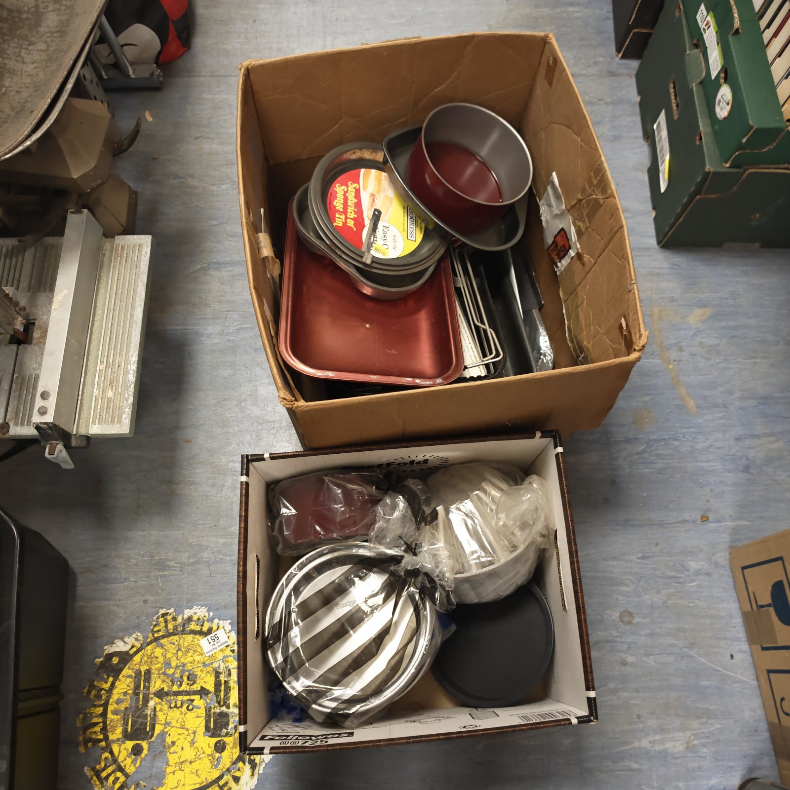 Mixed lot of vintage kitchen pots, pans, and roasting tins.
