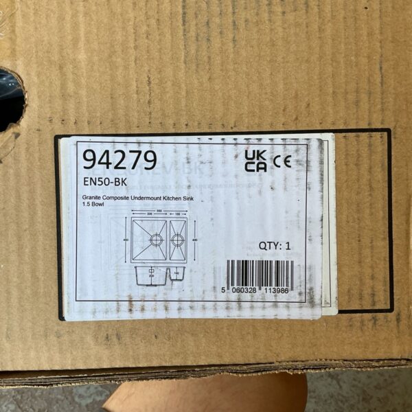 Boxed granite composite kitchen sink with model number visible.